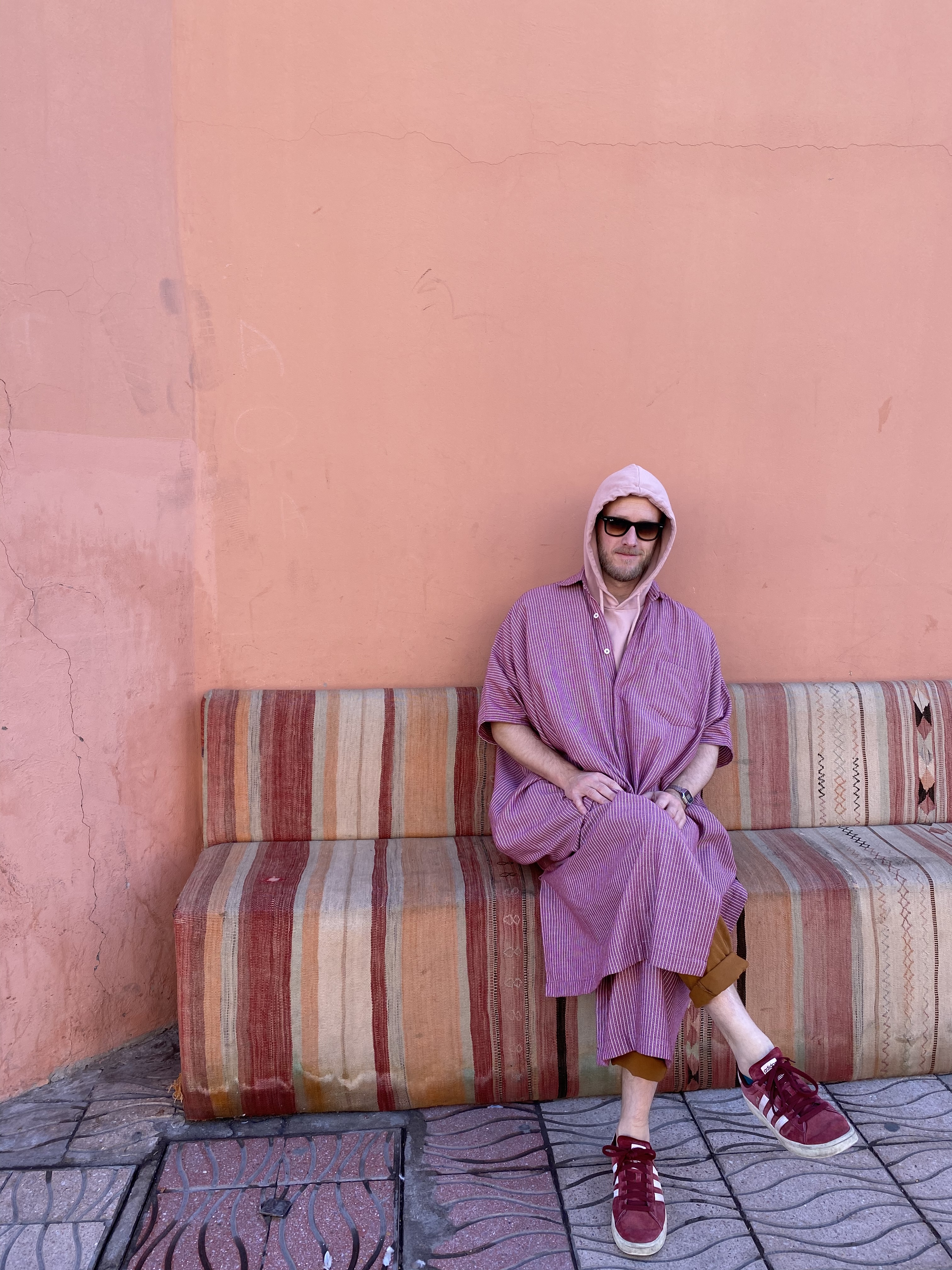 Mr. Kim in ivory djellaba, El Fenn courtyard