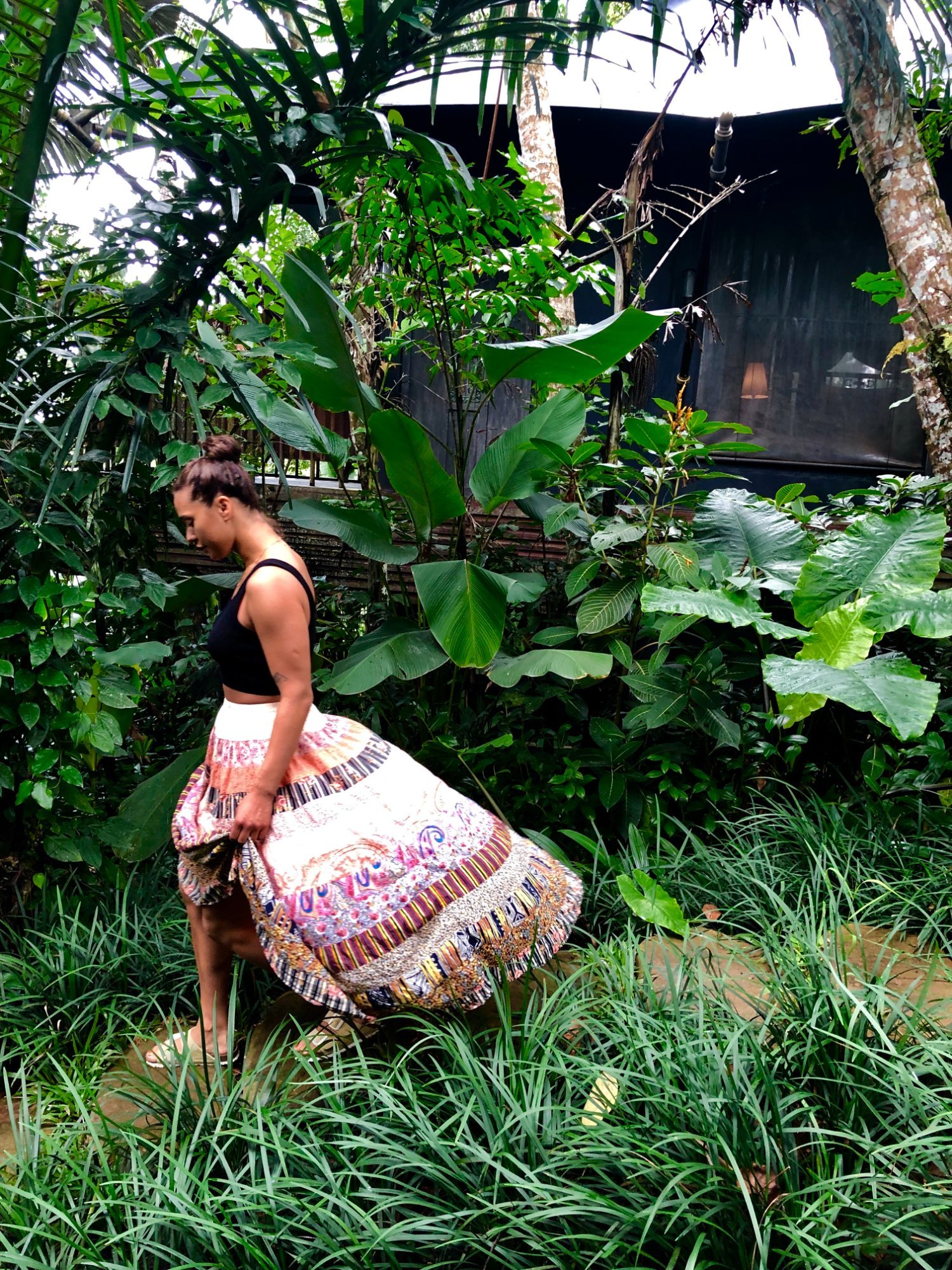 Coco walking past the tents