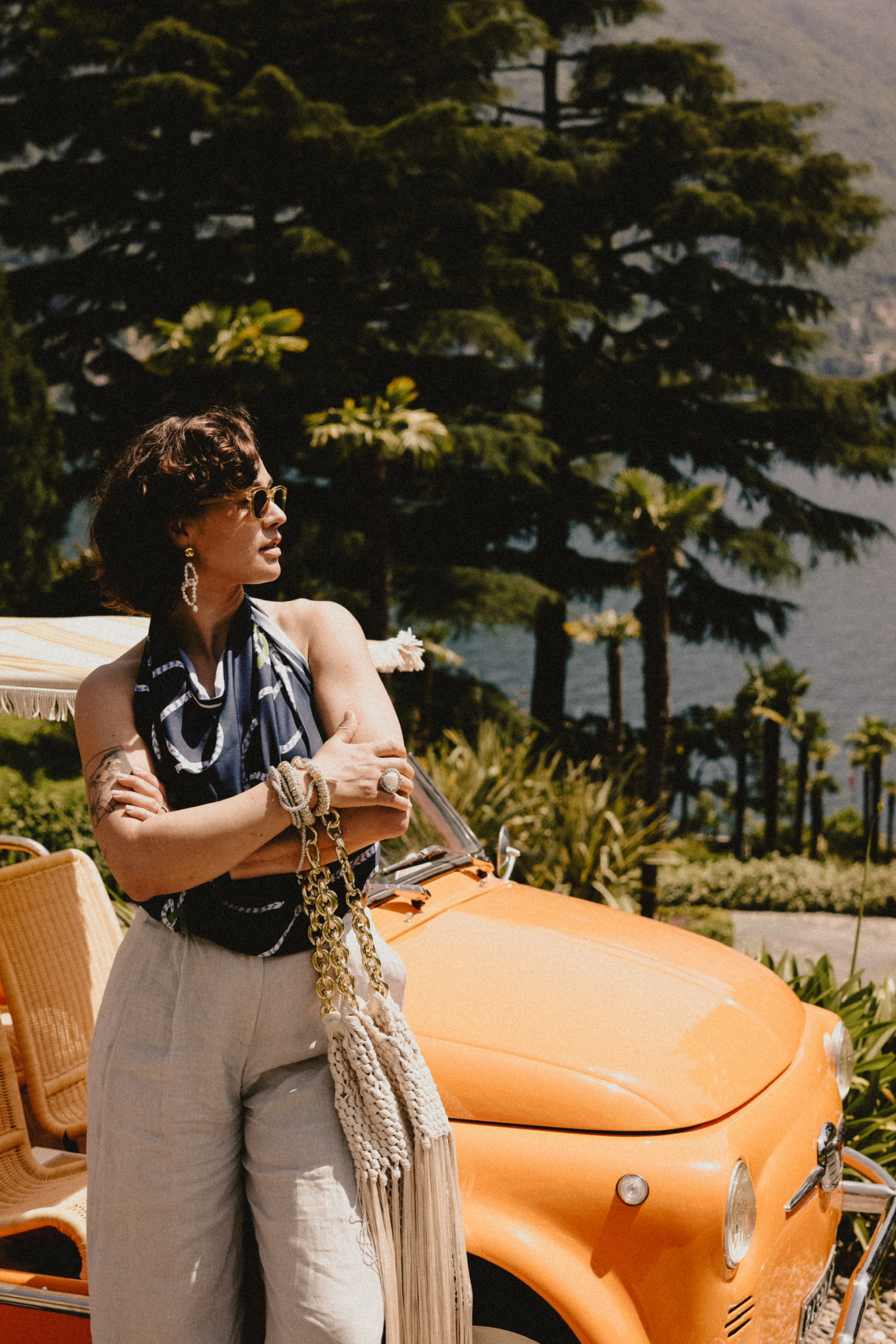 Coco beside Passalacqua&rsquo;s orange Fiat Jolly, Lake Como behind