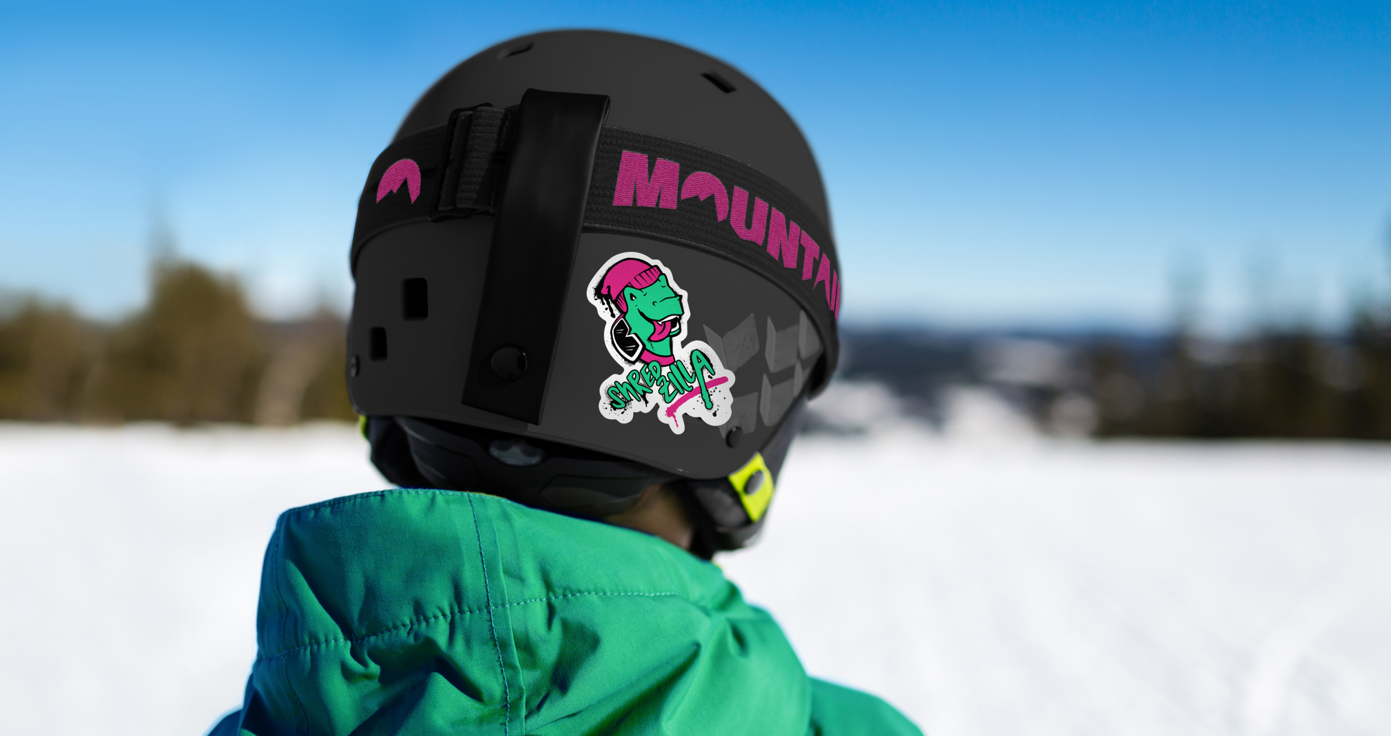 A child wearing a Mountain Kids Outfitters’ helmet.