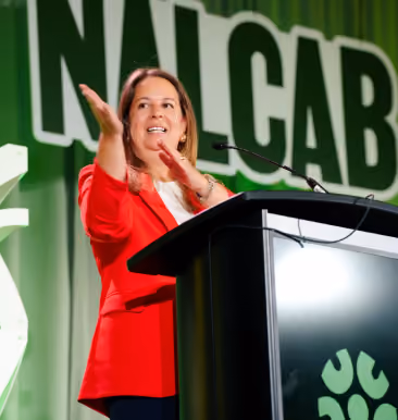 Speaker at the NALCAB conference podium