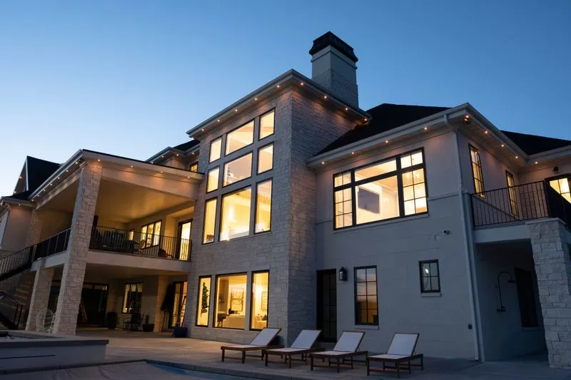 Exterior view of a modern home in Sioux Falls decorated with permanent outdoor lighting by 605 Holiday Lighting