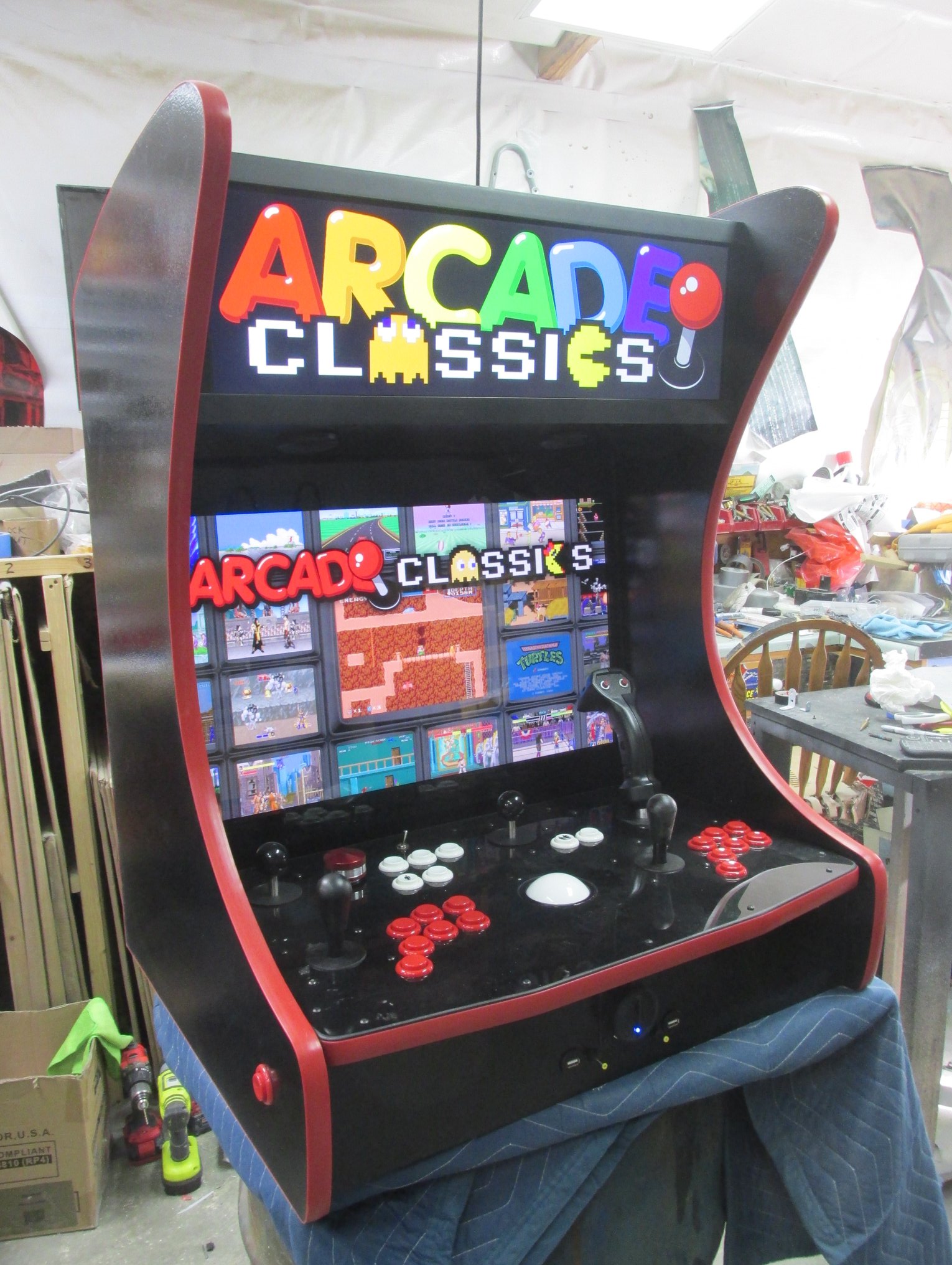 2-Person Table Top with standard buttons, trackball, Tron stick, flipper buttons, passive marquee