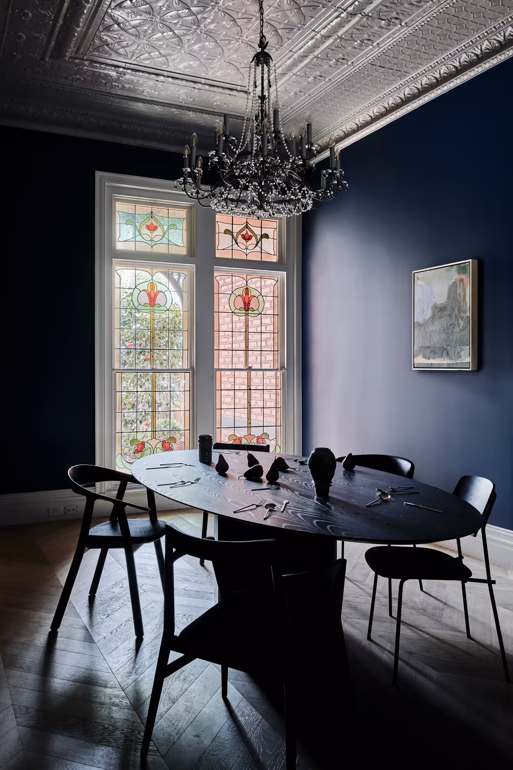dining room with navy walls, pressed-metal ceiling, chandelier and leadlight windows, opus 73, middle park