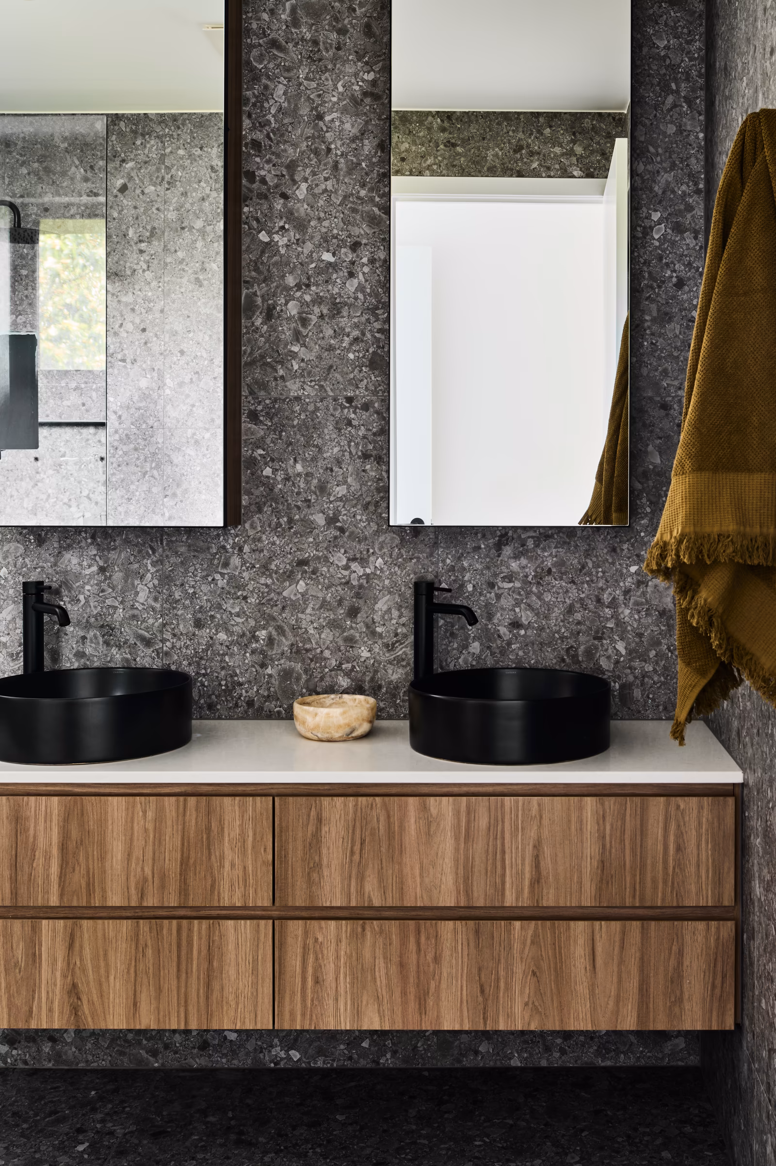 bathroom with twin black basins on a timber vanity and grey terrazzo-look tiles, opus 4, thornbury