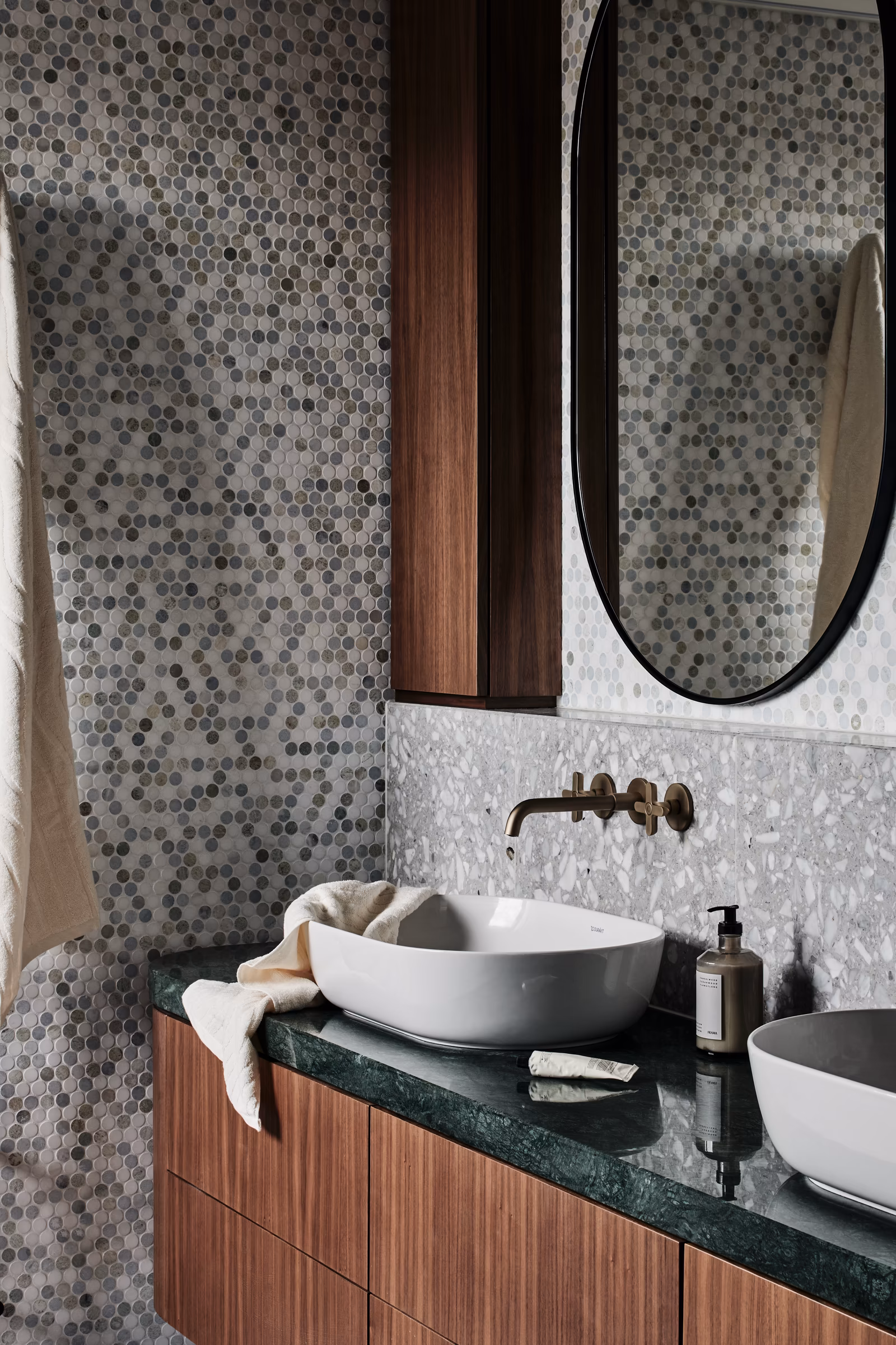 bathroom with penny-round mosaic, green stone vanity top, timber cabinetry and brass tapware, opus 73, middle park