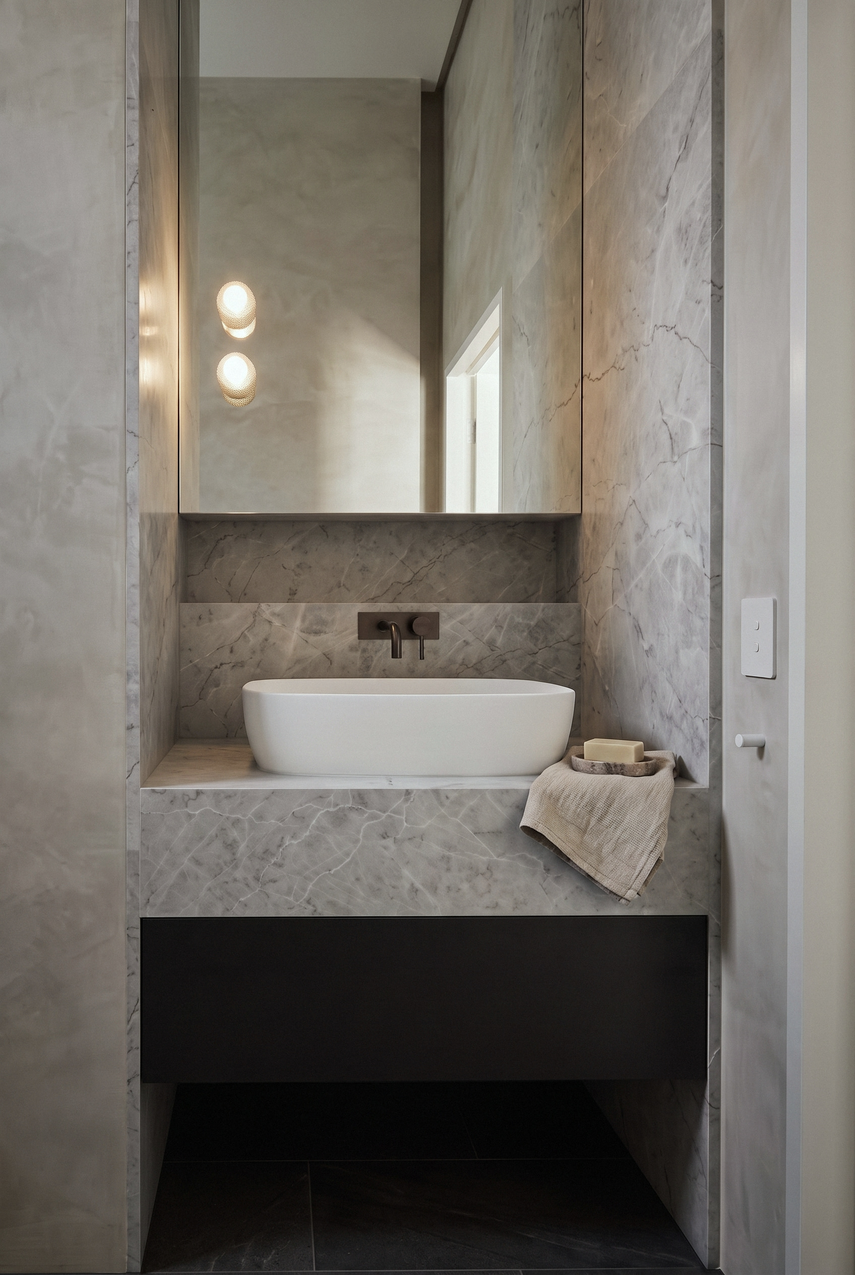 render of the powder room with a white vessel basin on grey veined dolomite and polished plaster walls, opus 11, malvern