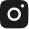 Icon of a camera with a circular lens and flash symbol.