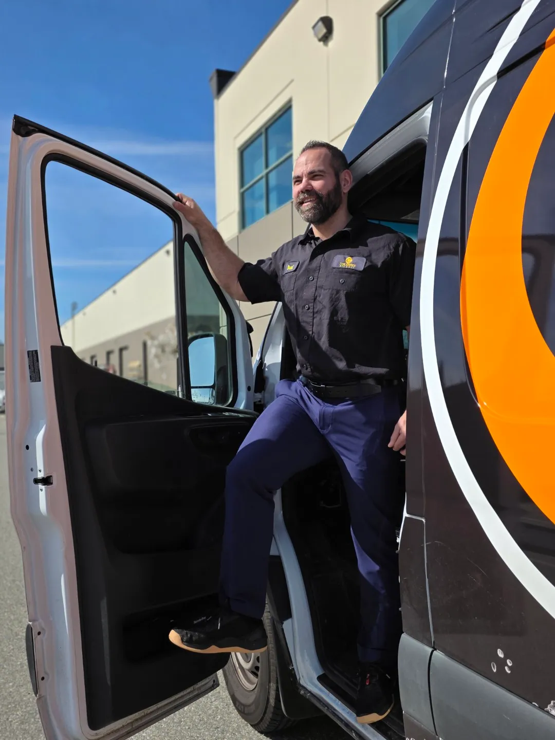 The Crazy Plumber owner Brad Piacek in a company service van outside The Crazy Plumber offices in Port Coquitlam