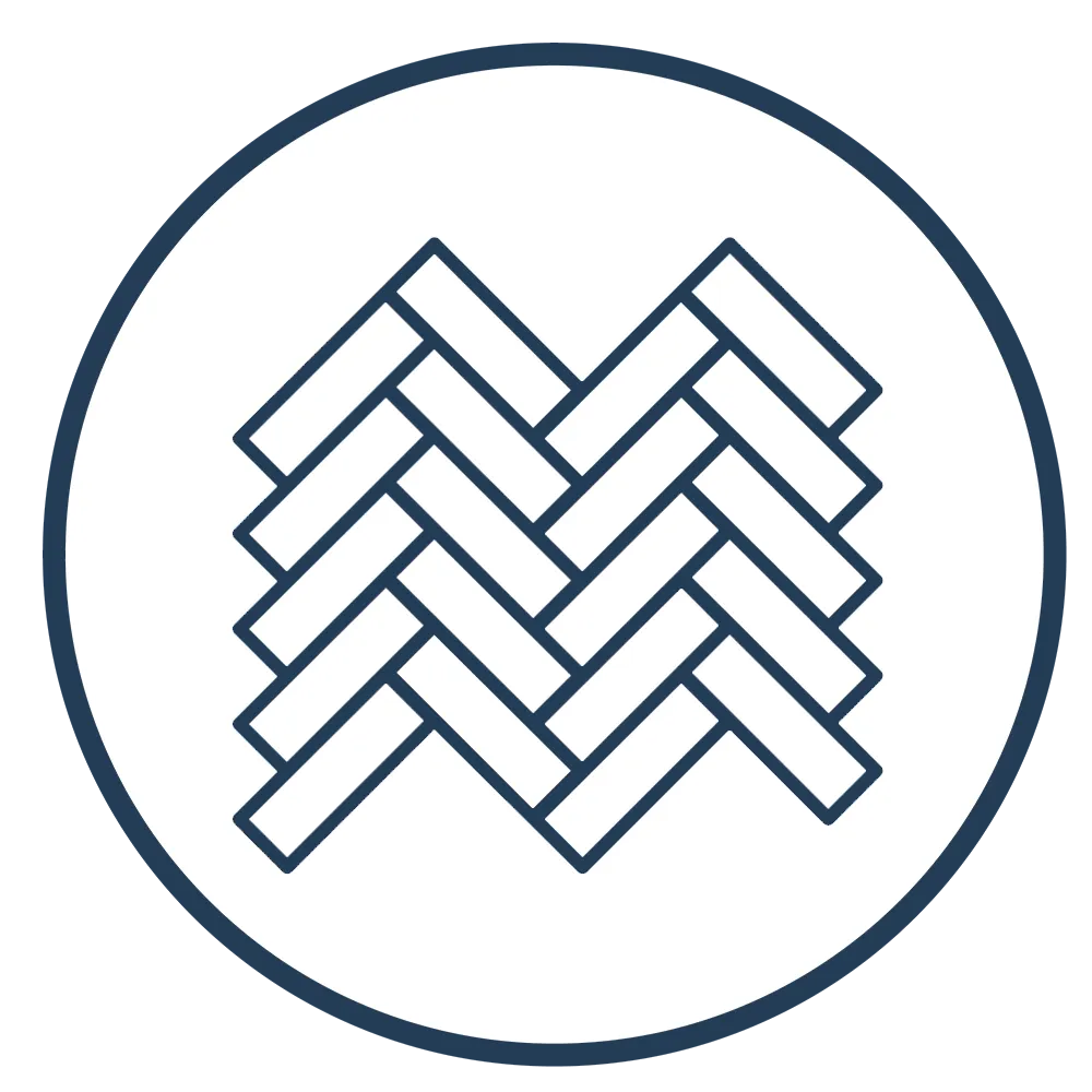 Icône de motif de parquet en chevron dans un cercle blanc avec un fond bleu marine.