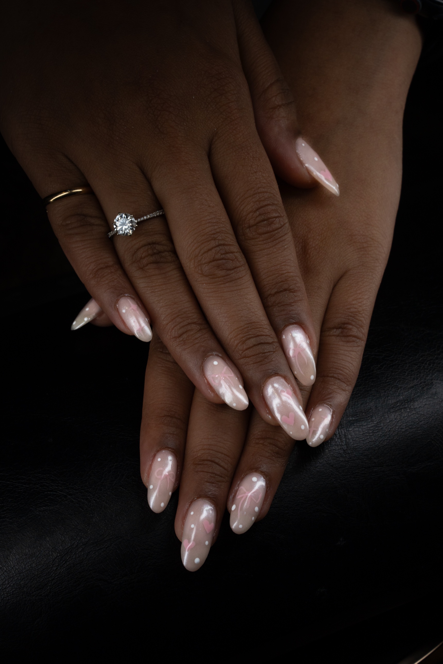 Pearl chrome gel manicure with pink bows and hearts, complex nail art Dubai March14