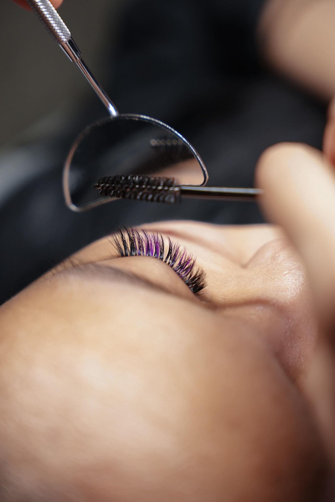 Professional lash extensions being applied with coloured lashes at the March14 Lash and Brow Atelier in Dubai