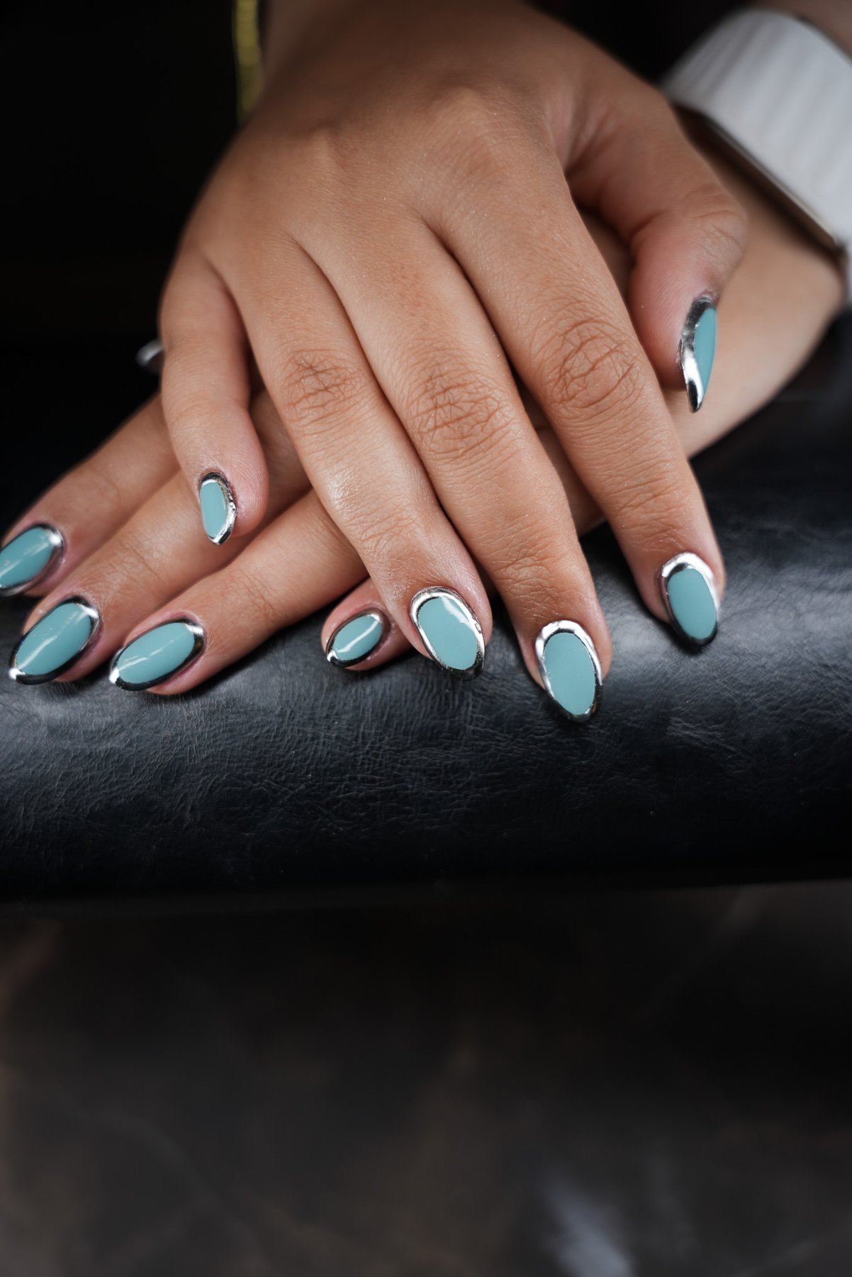 Short aqua nails with silver chrome outline, modern manicure Dubai March14 Beauty Residence