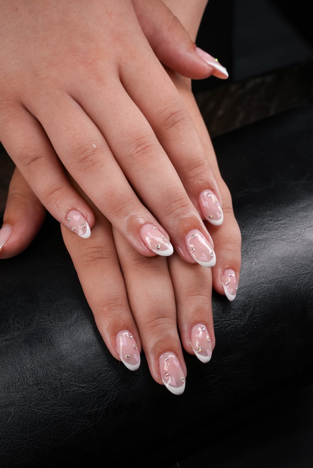 White French manicure with micro crystals on soft pink almond nails, Dubai nail salon March14