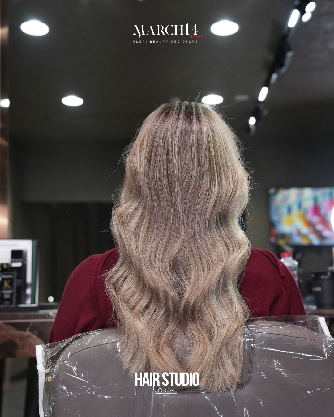 Finished natural blonde highlights with soft waves and a shadowed root at March14 Beauty Residence in Dubai
