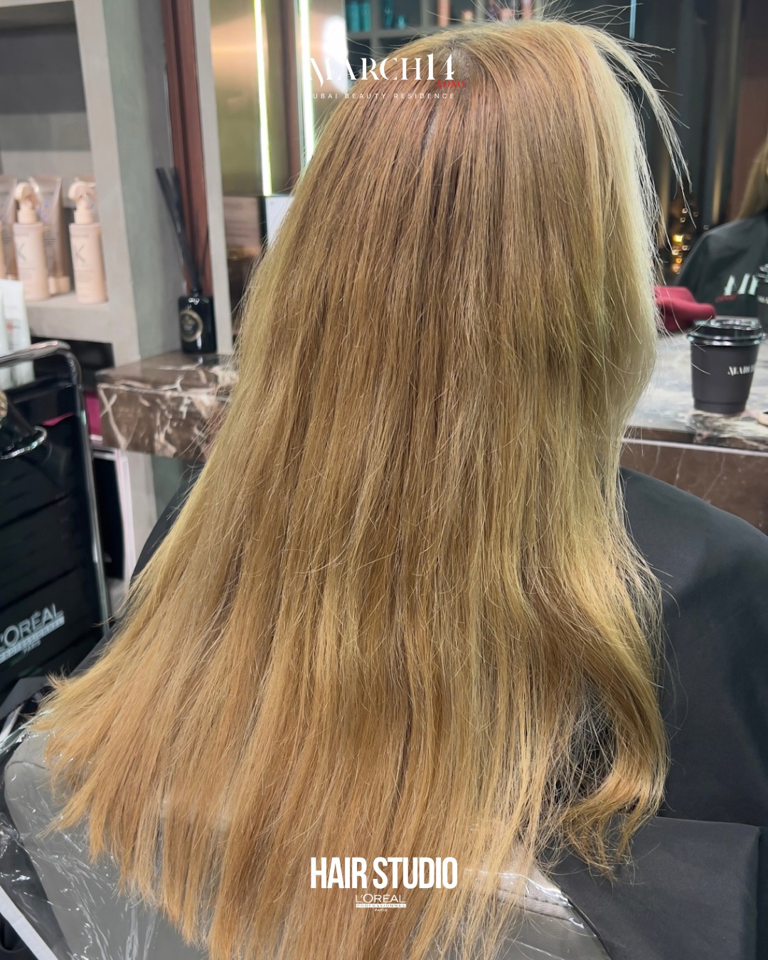 Before: warm golden hair with darker regrowth before natural blonde highlights at March14 Hair Studio in Dubai