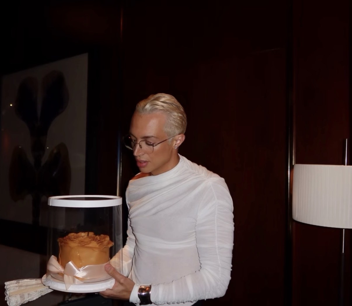 Platinum blonde for men in Dubai, short slicked back platinum hair with a polished finish by March14 Hair Studio