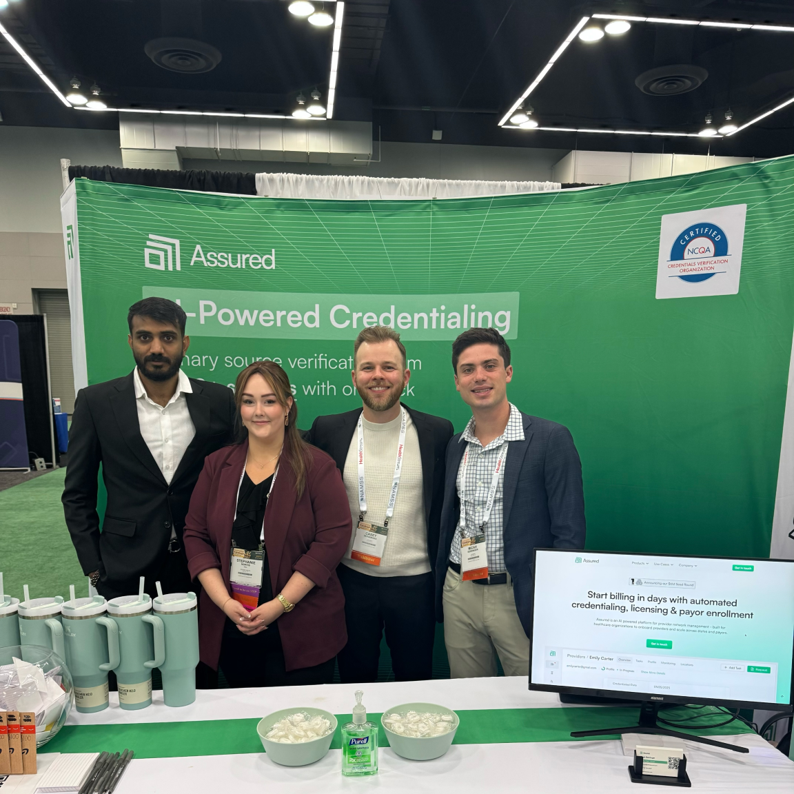 Assured team at a conference