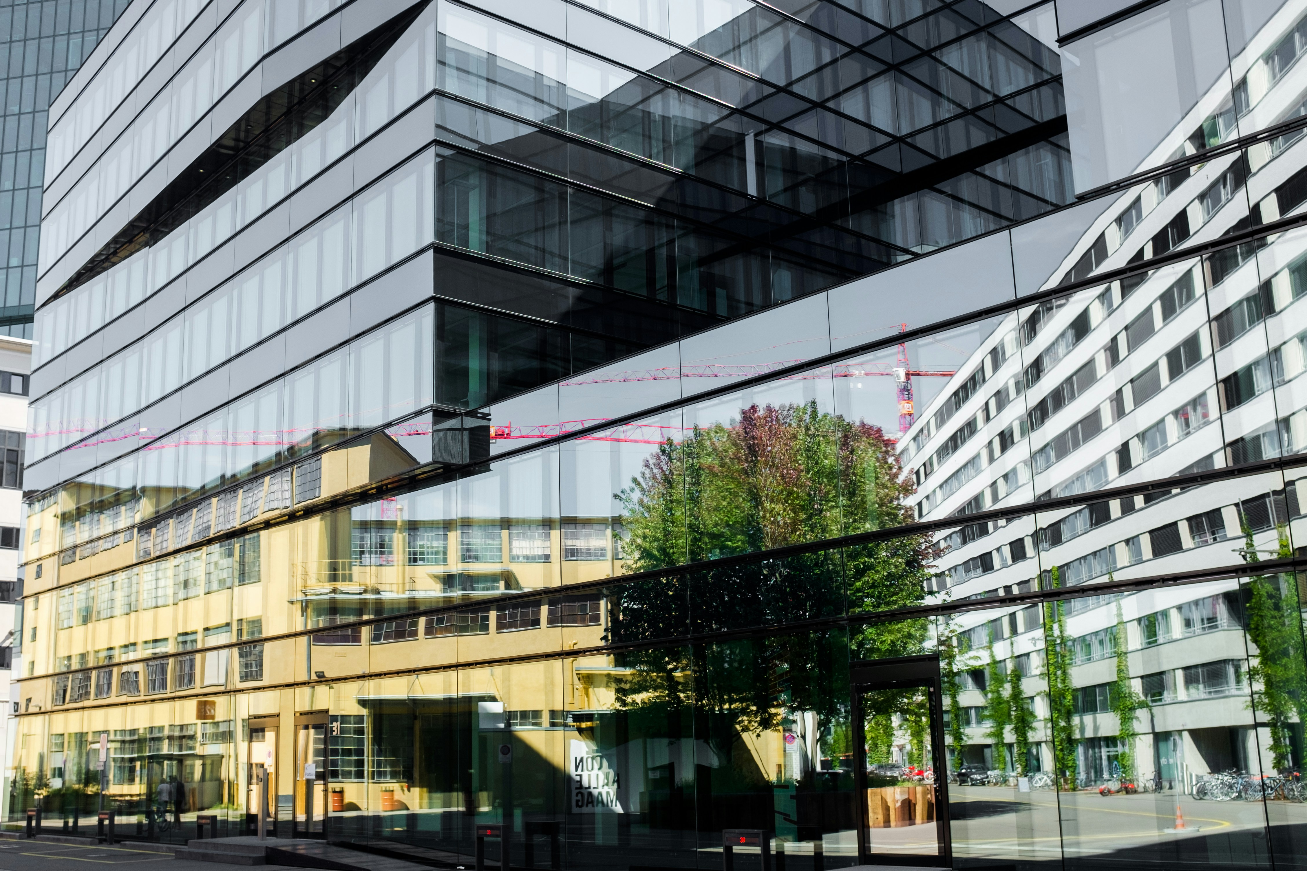 Modern commercial building reflecting surrounding urban environment