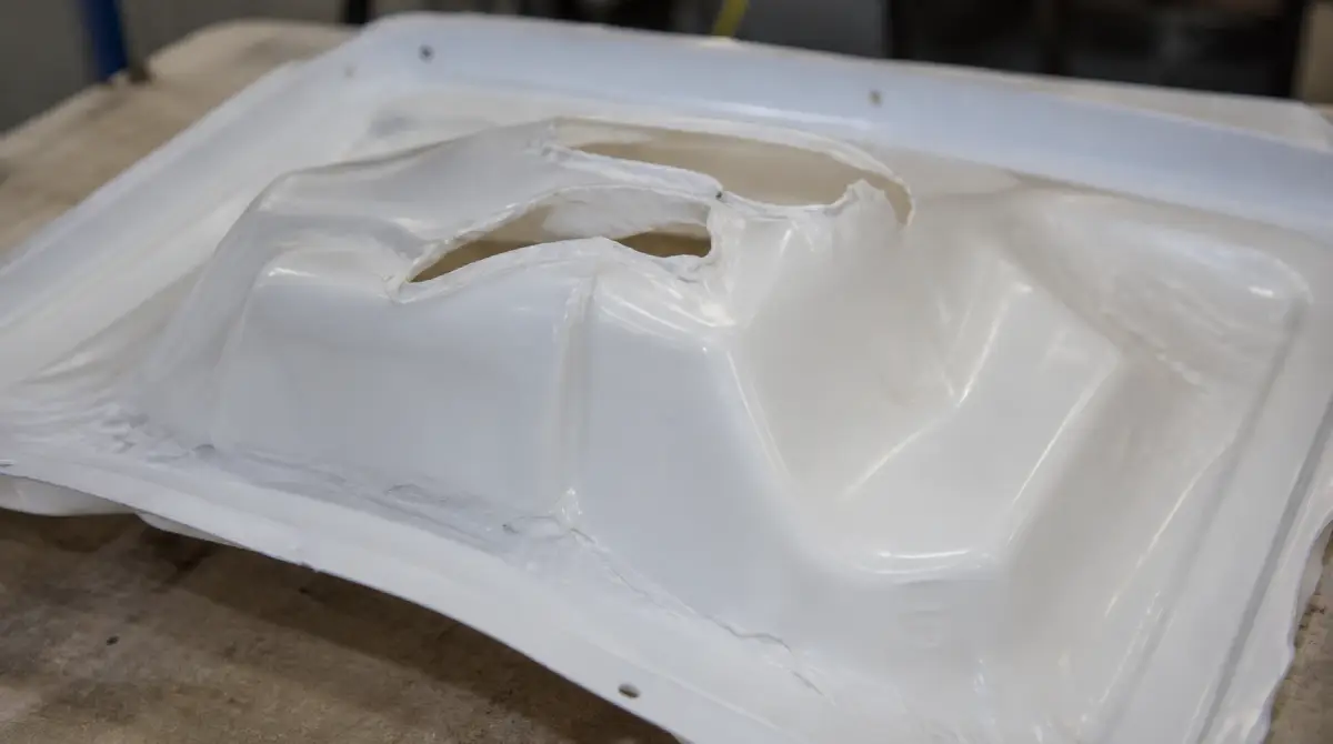 Vacuum forming disadvantages – plastic part tearing and deformation defect example