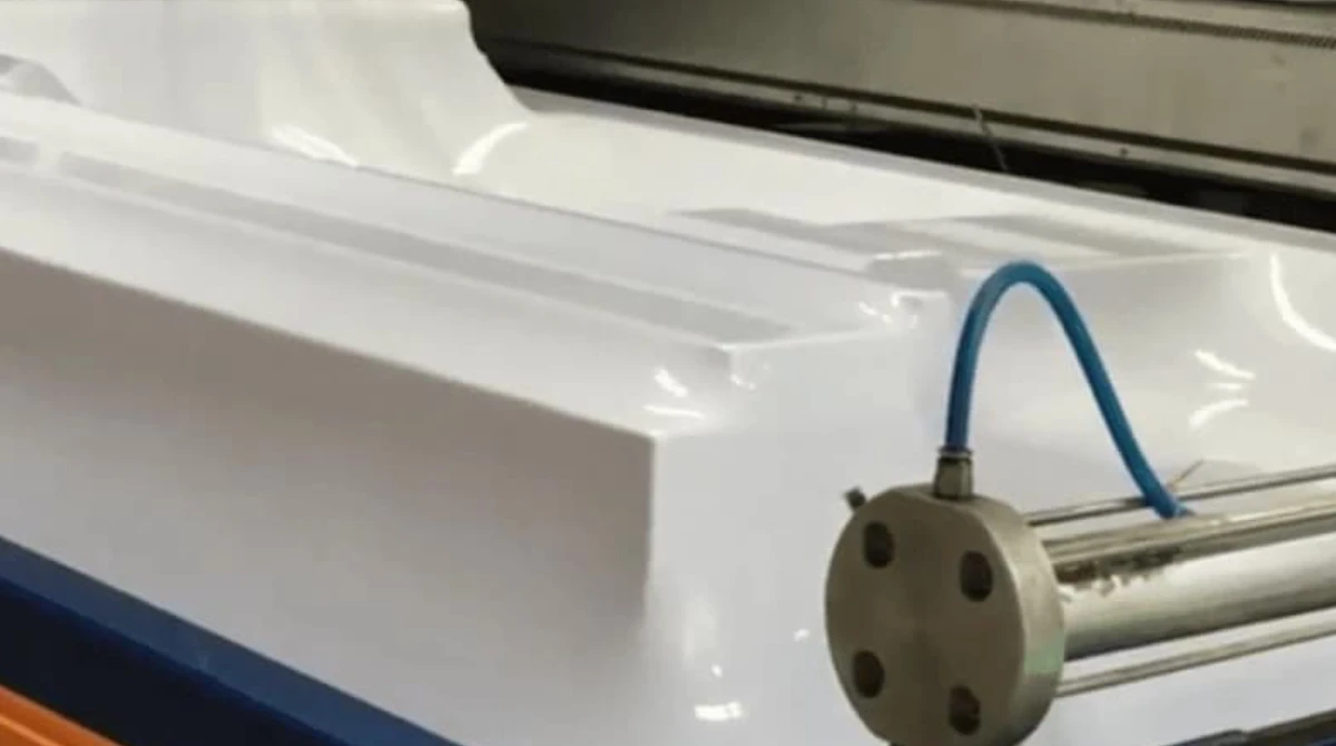 Thermoformed HIPS part showing incomplete draw in deep corners and edges where sheet cooled before full vacuum contact