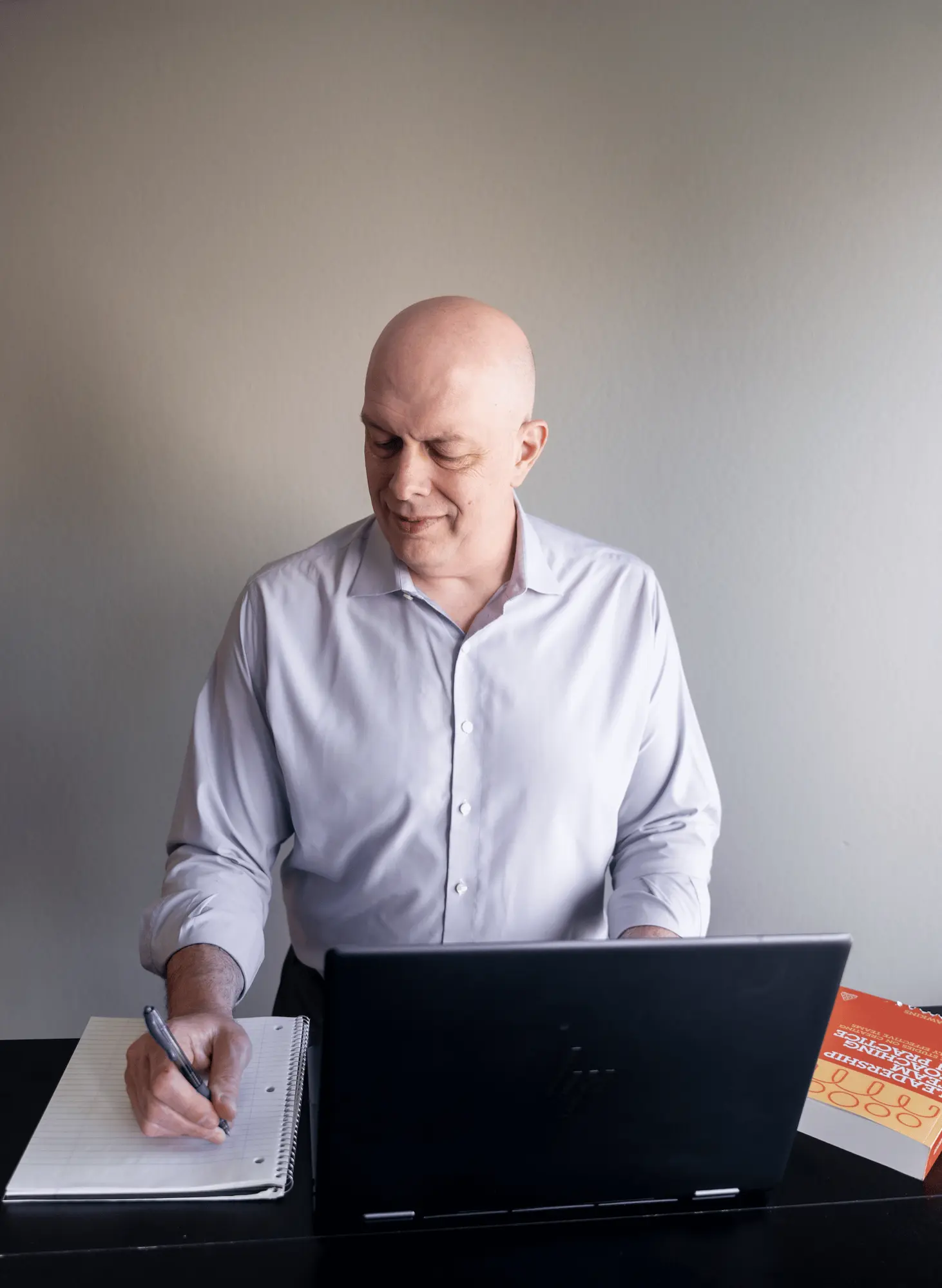 Matthew Johnson reviewing business information from an operator perspective.