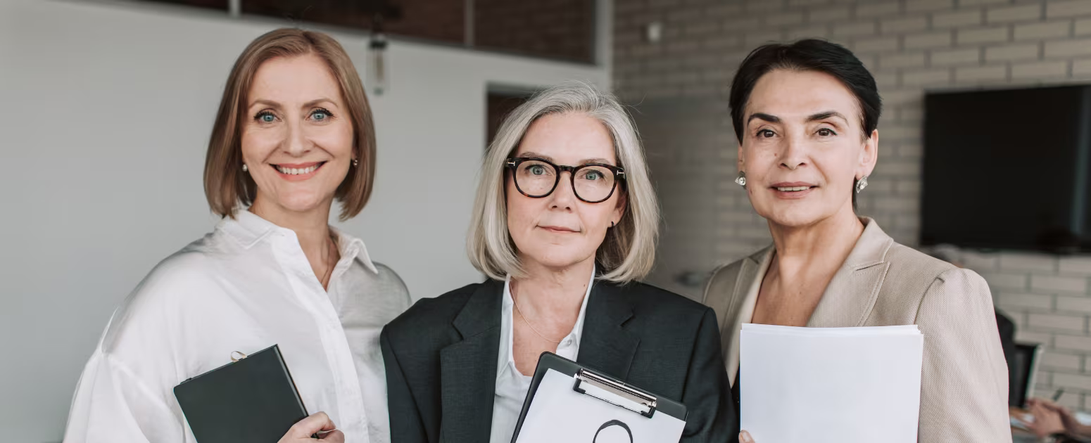 ISO 45010 Menopause at work guidance: Three women at work