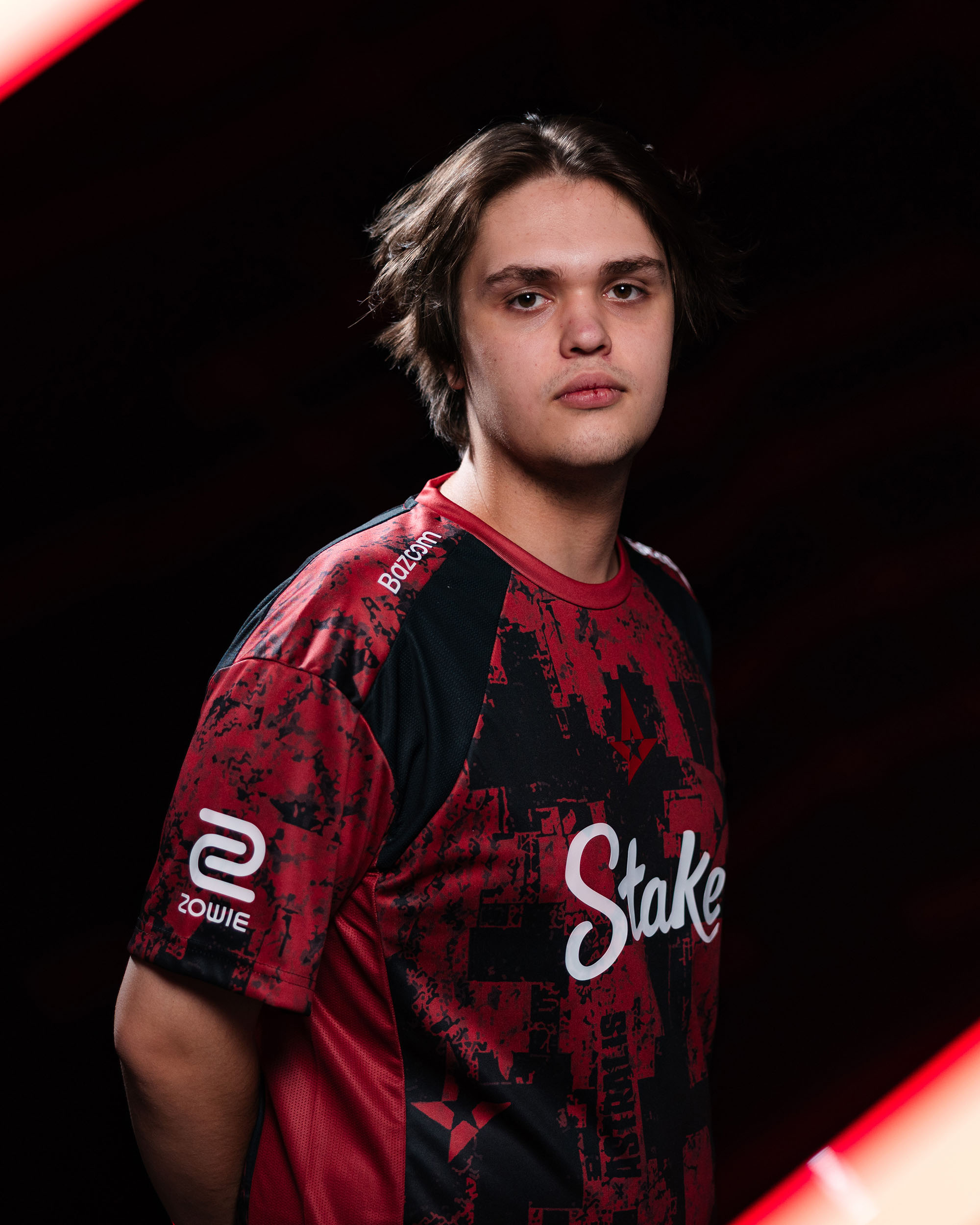 Nikita “cmtry” Samolotov wearing the Astralis red and black esports jersey, front view.