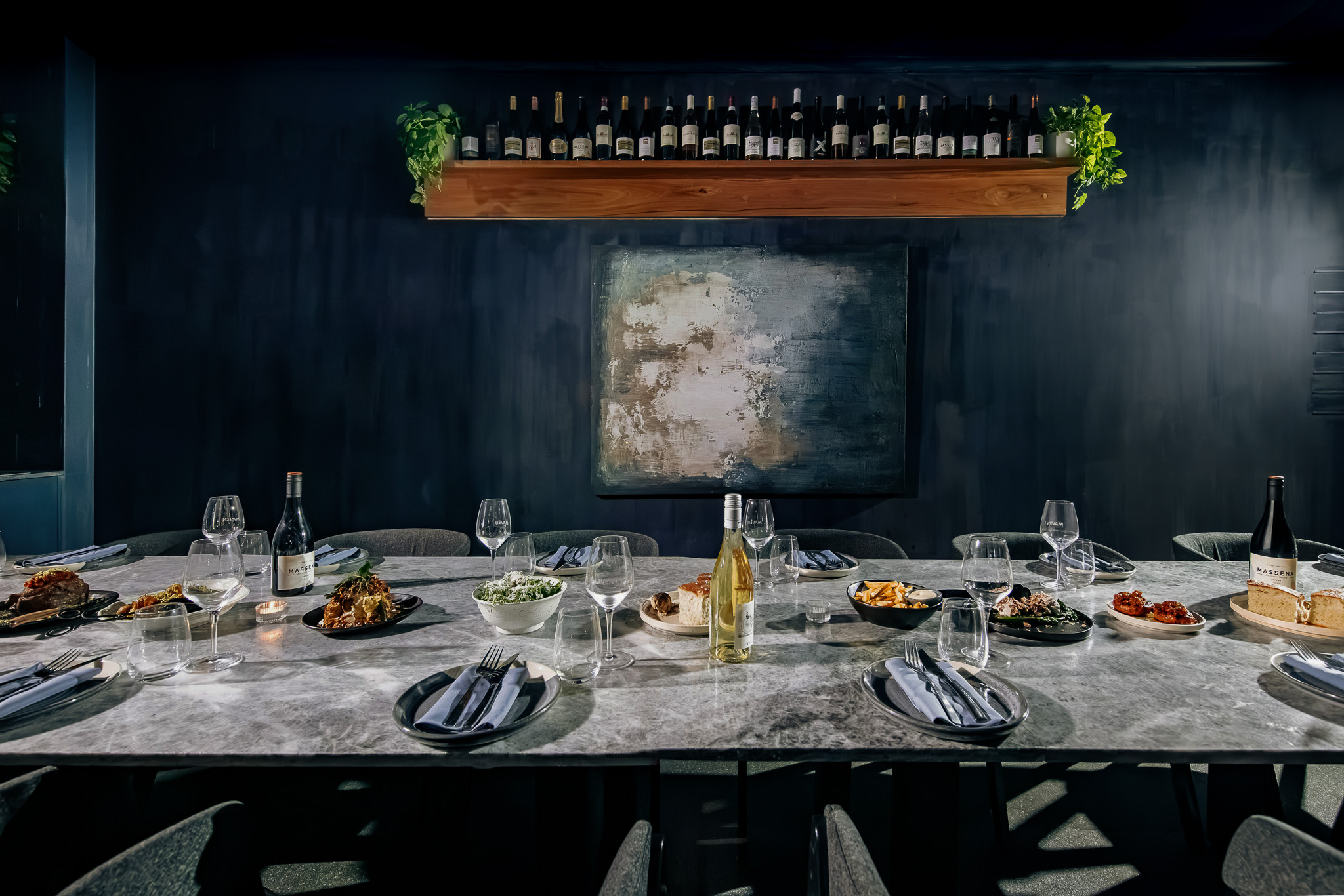 The Wine Room at Maven by Morgan, a private dining room lined with a wine wall