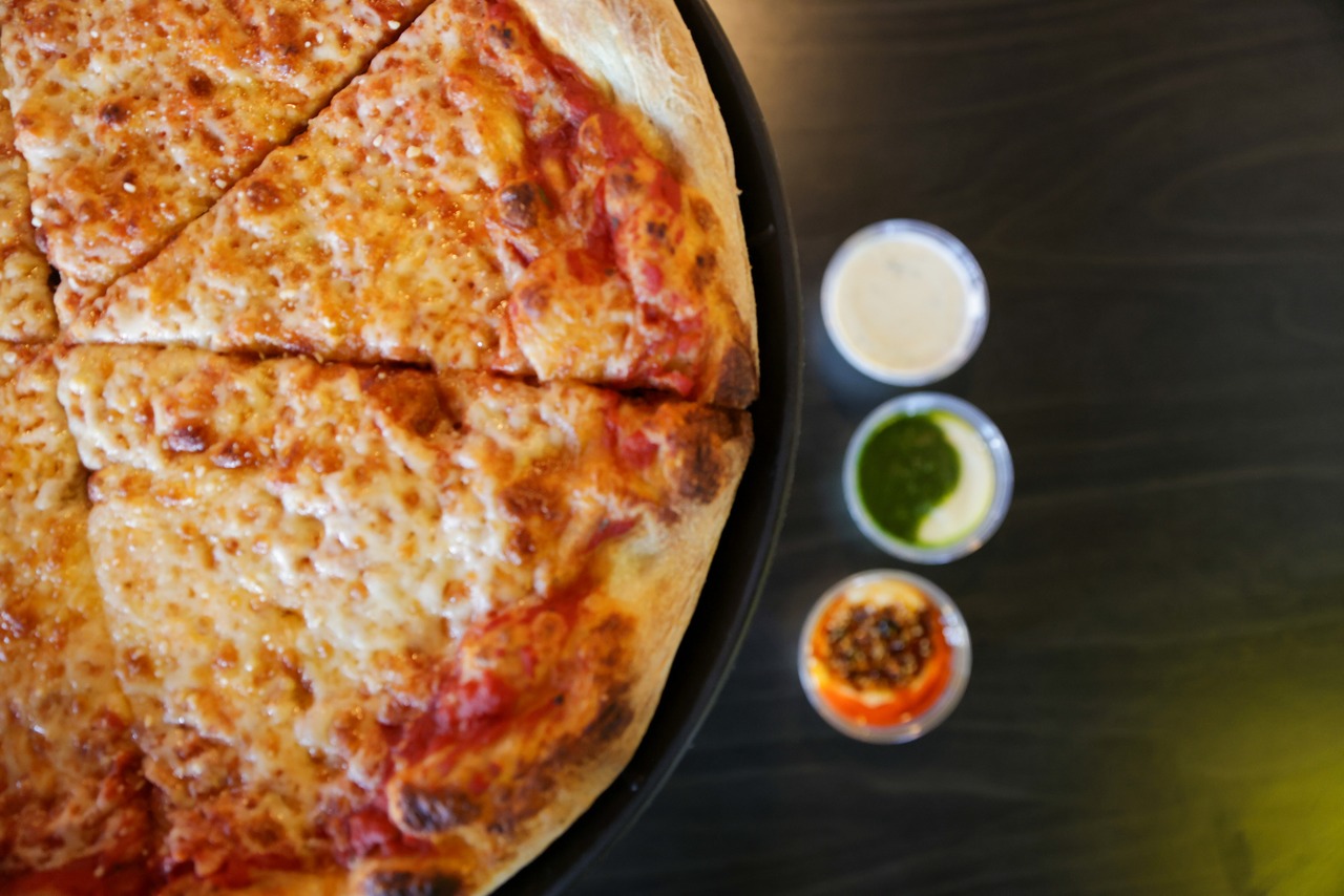 Boom’s Pizza offers dog-friendly pizza slices to support Cuyahoga County Animal Shelter