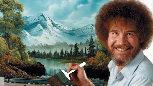 An image of Bob Ross smiling in front of a landscape painting.