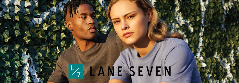 Lane Seven Catalog image of a man and woman in front of a vine-covered wall