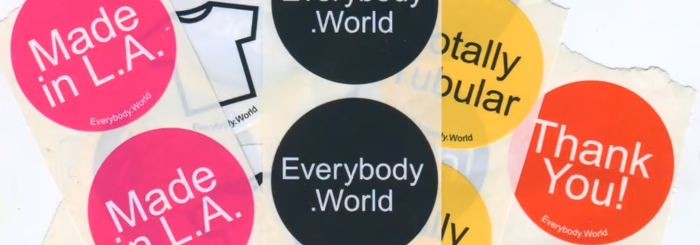 Stickers with Everybody.World's logo and sayings.
