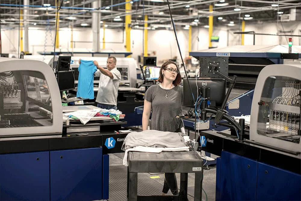 Large DTG printers in a Print On Demand Warehouse