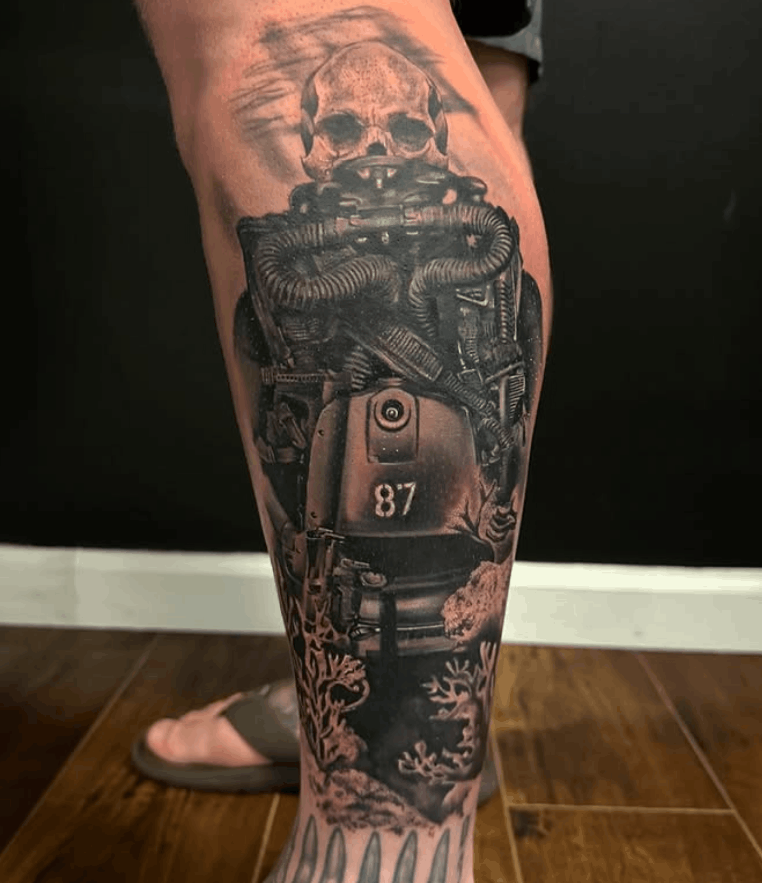 Tattoo of a scuba diver with a skull head with no helmet by Noah Brewer