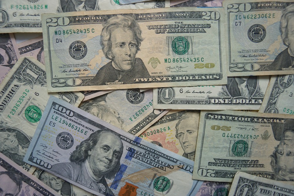 Photo of USD in a pile