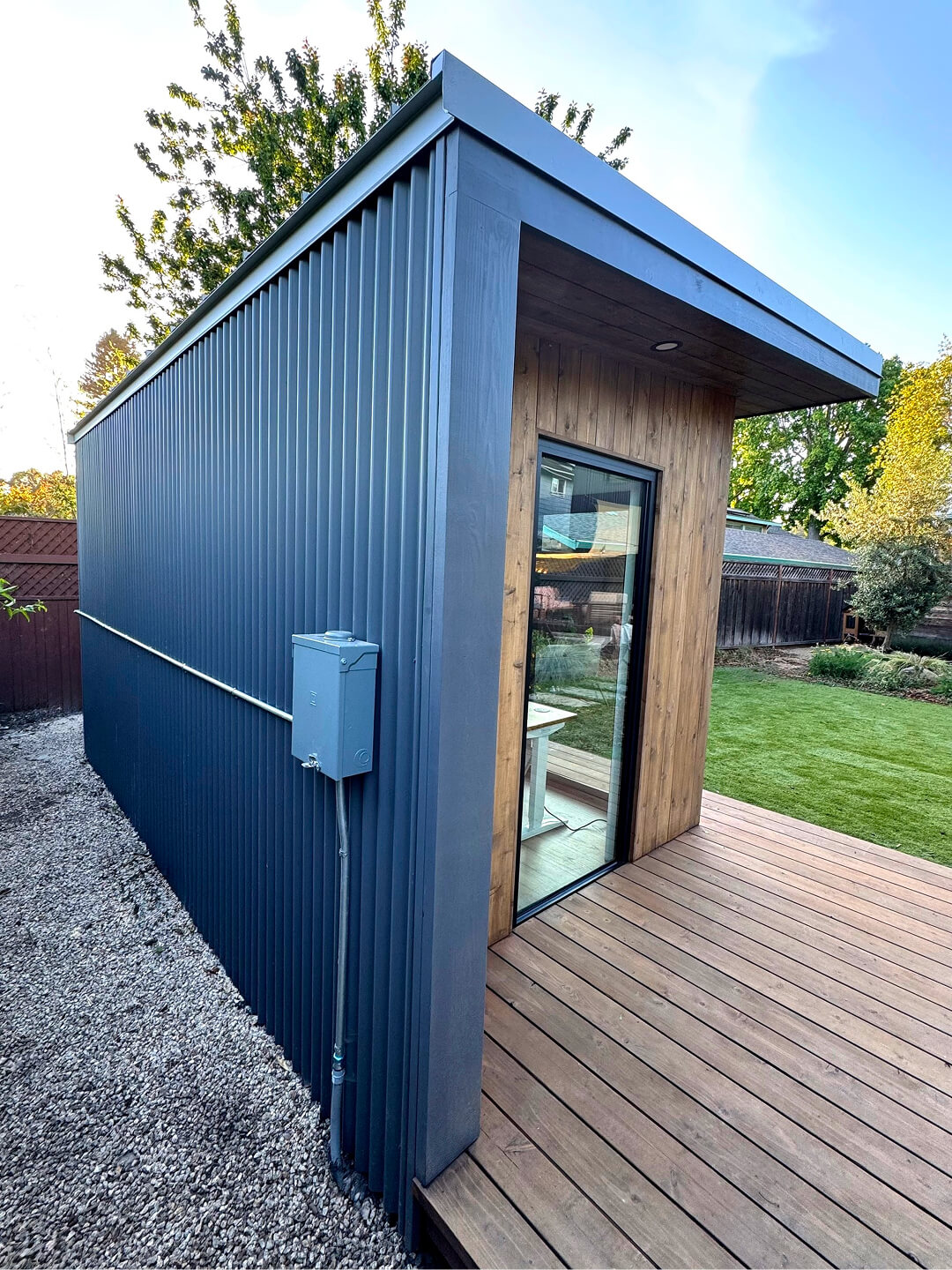 Corner view of the Monterey backyard office featuring contemporary architectural design
