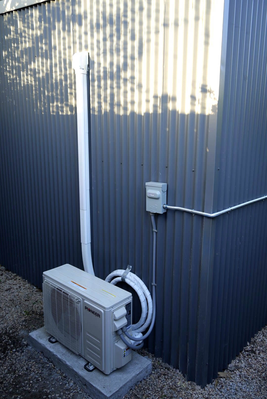 Rear exterior of the Monterey backyard shed with mini-split HVAC system