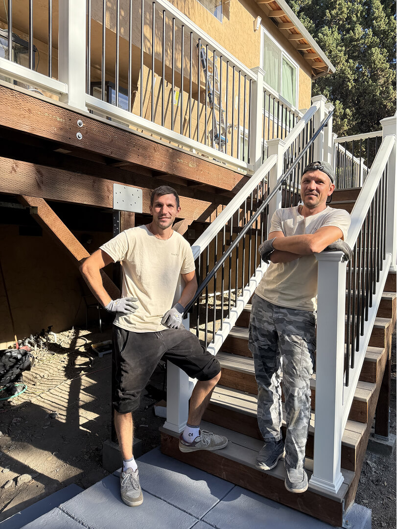 Rivolty builders installing composite decking boards