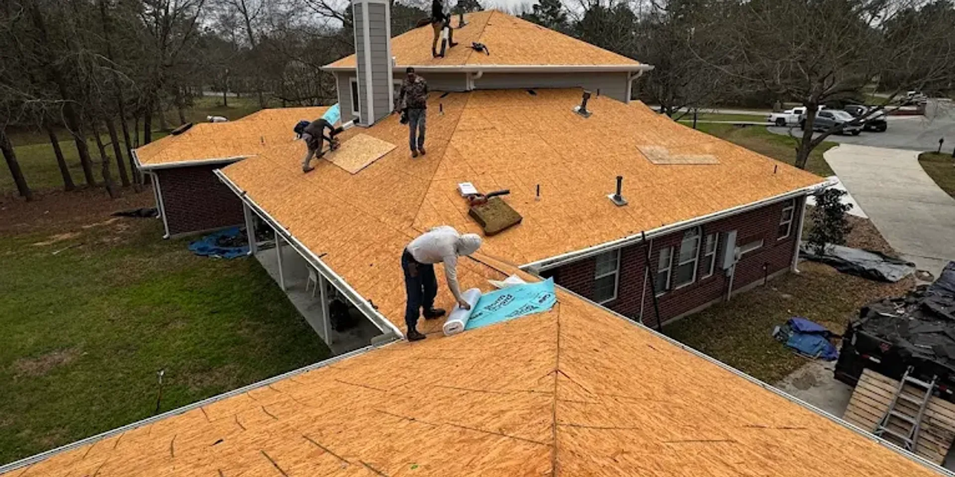 Houston residential roof inspected by AI-powered drone technology with storm clouds gathering overhead during hurricane season preparation