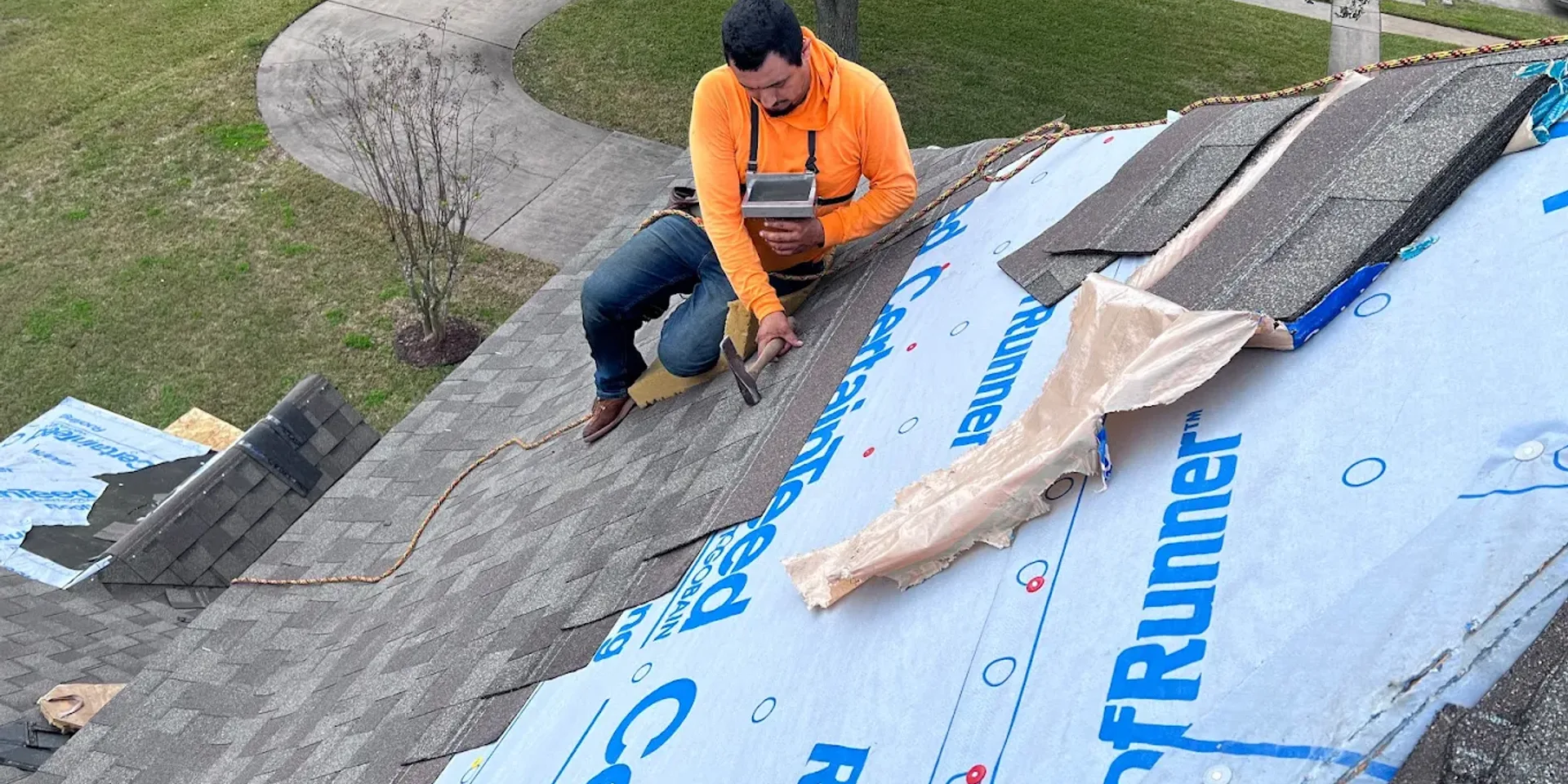 Residential roof being inspected by a professional in Sugar Land Texas