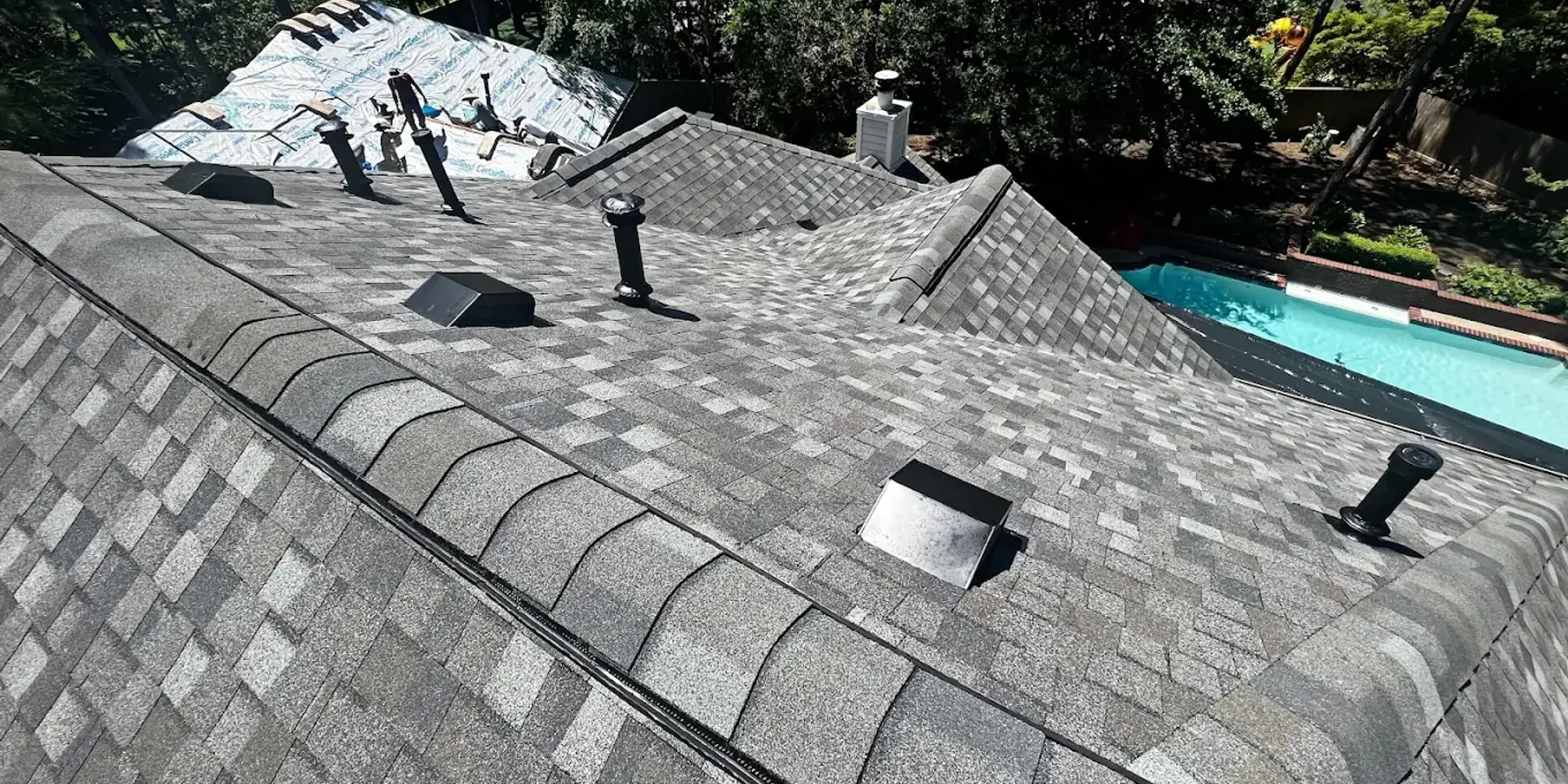 Solar panels installed on a residential roof with blue sky