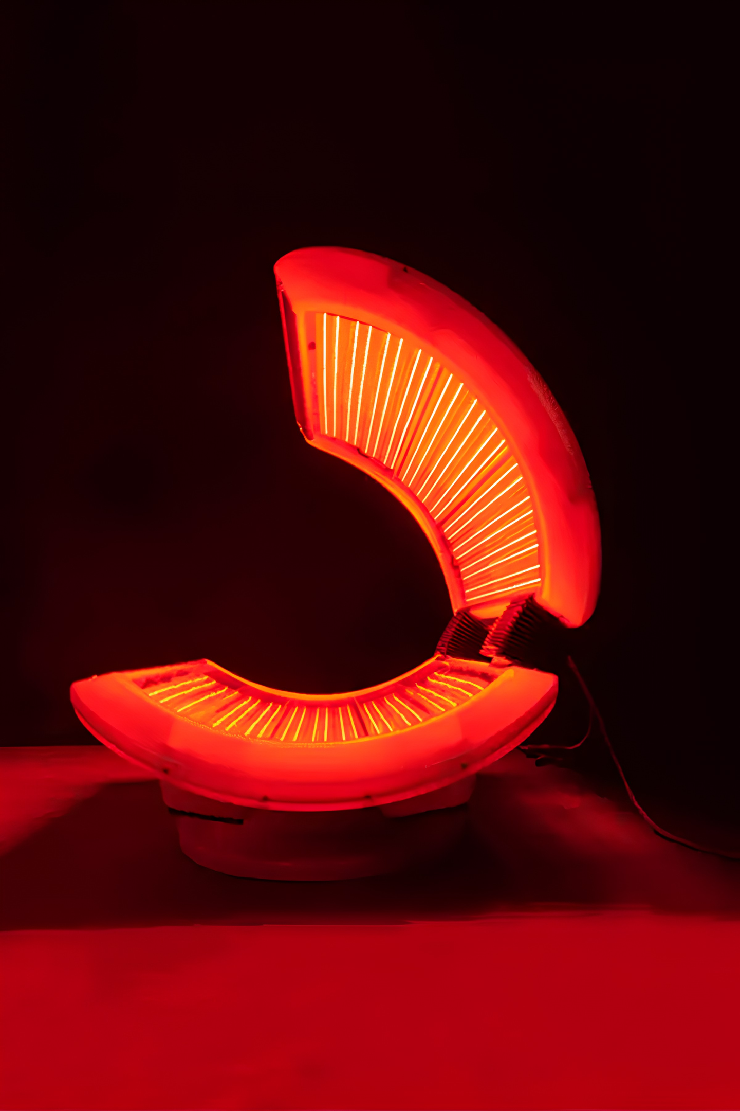 Moonlight crescent-inspired LED cabin lit from inside, studio view.