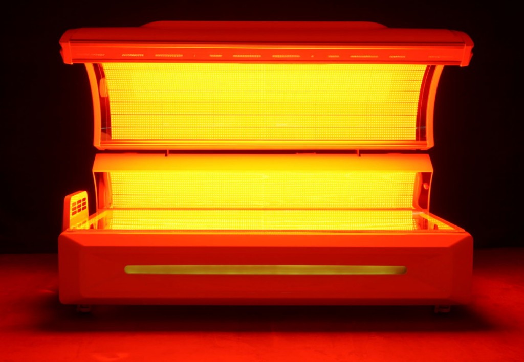 White Synergy red light therapy bed open, LED interior lit.