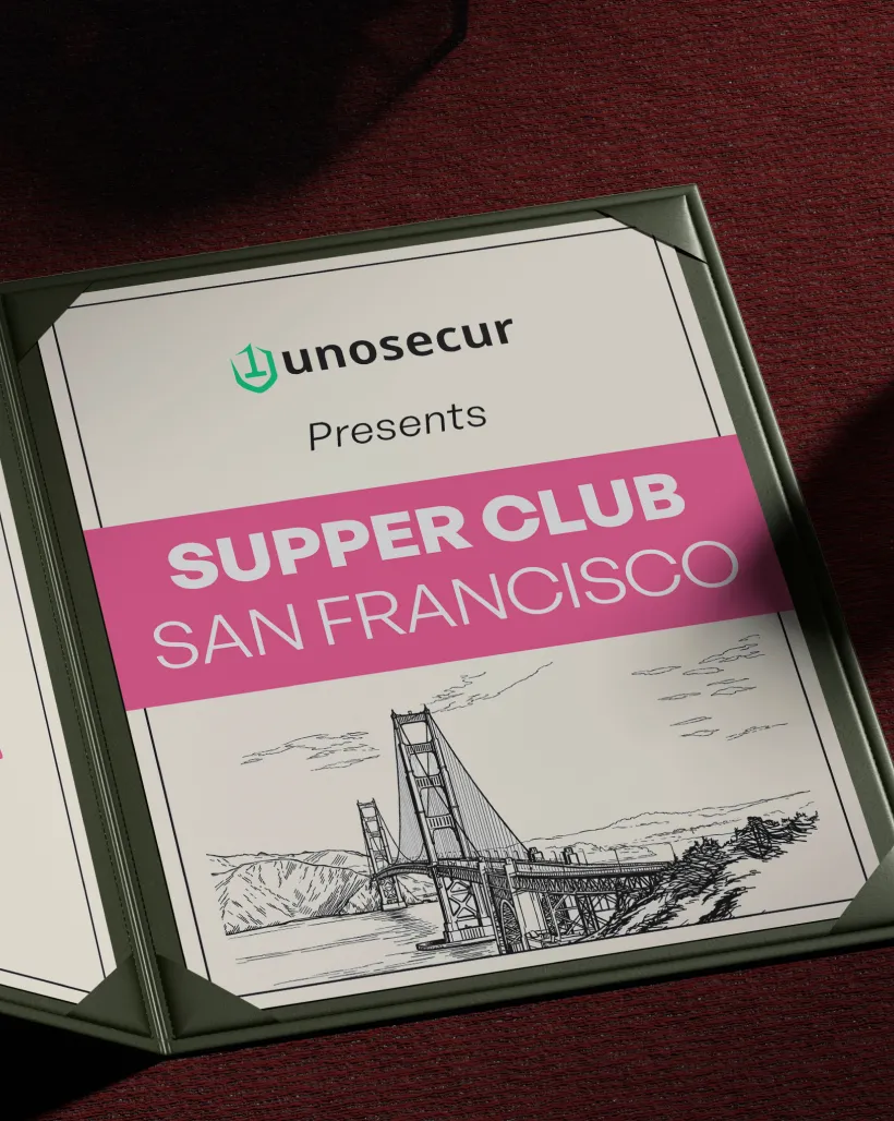Framed poster on a textured red surface reading 'unosecur Presents SUPPER CLUB SAN FRANCISCO' with a sketch of the Golden Gate Bridge.