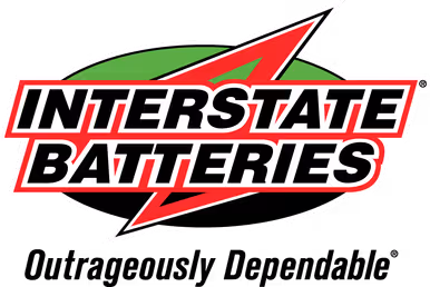 Interstate Batteries company logo with bold black and red text over a red lightning bolt and green oval background.