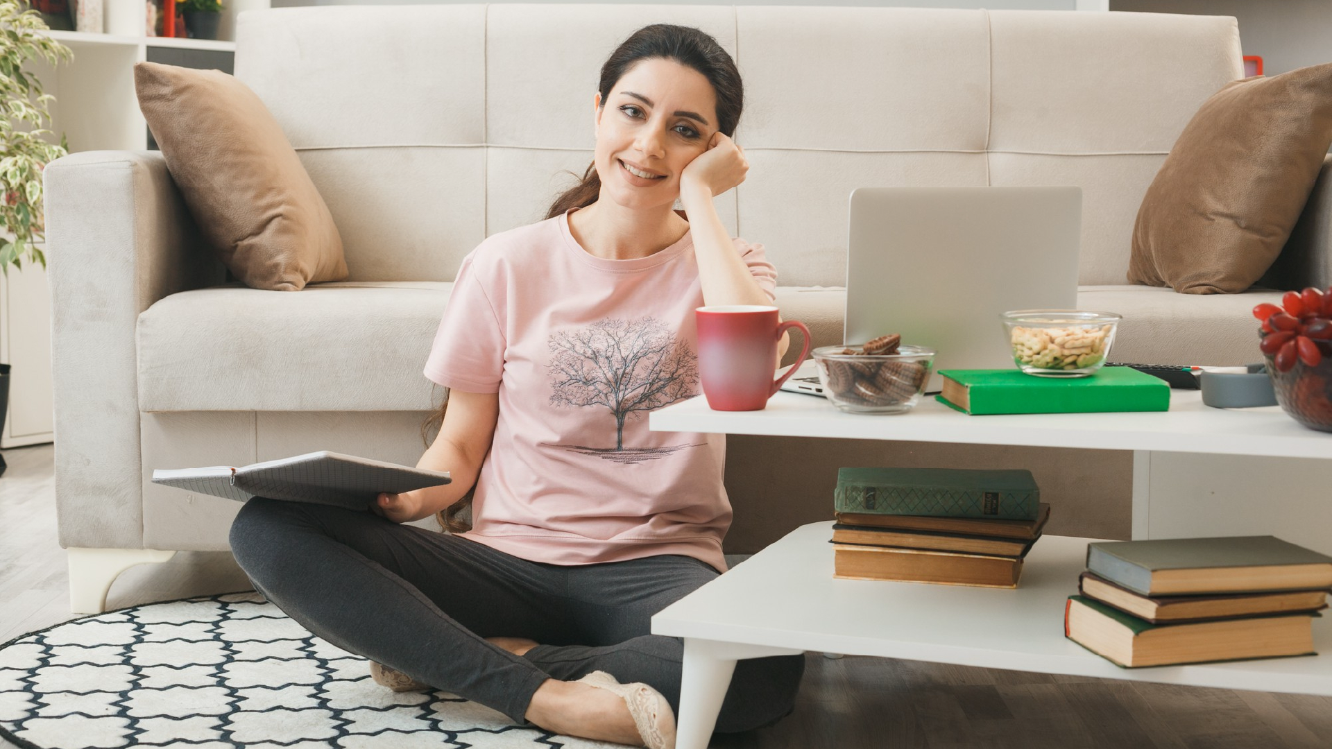 White light bulb icon with teal glowing stars and a sun symbol representing creativity and ideas.