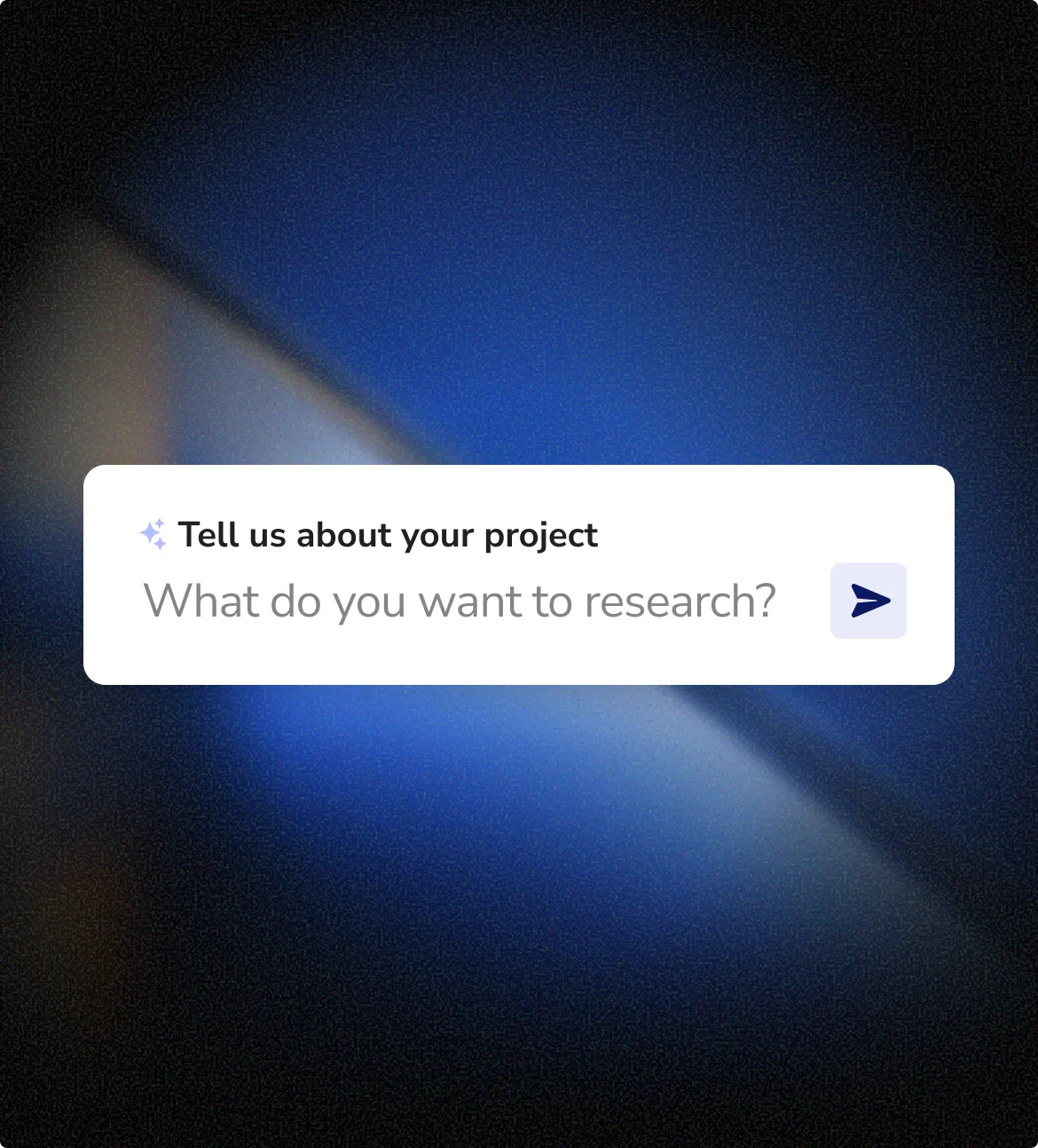 Text input box with the prompt 'Tell us about your project' and placeholder text 'What do you want to research?' on a dark blue blurred background.