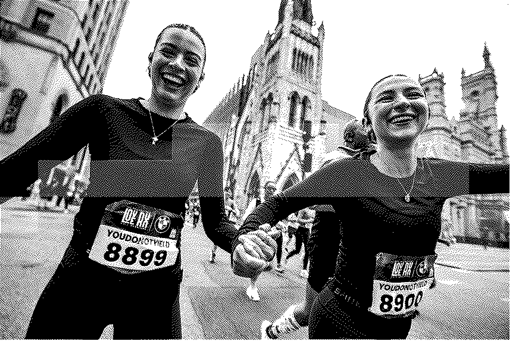 Two smiling women holding hands while running a race in an urban setting with a historic building in the background at the Shoreditch 10k.