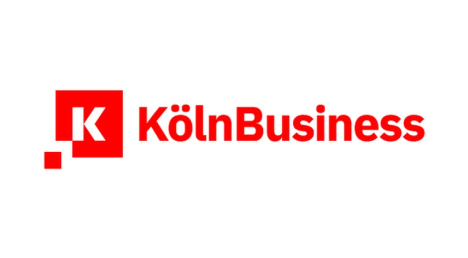 CologneBusiness logo with a red square containing a white letter K and red text 'KölnBusiness'.